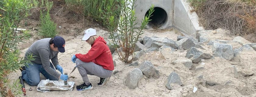SCCWRP’s Jerod Gray, left, and Liesl Tiefenthaler collect media samples from a biofiltration BMP in Orange County for microplastics analysis. Researchers have found that biofiltration BMPs offer an efficient solution for removing microplastics from runoff in Southern California.