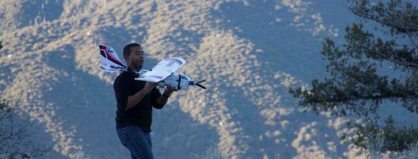 Above, Vev Jackson, a PrecisionHawk UAS pilot, prepares to launch a fixed-wing UAS for a high-altitude test flight in the San Bernardino Mountains in January. The team was testing the use of a multispectral camera system at an elevation of 6,500 feet near Big Bear along the upper Santa Ana River.